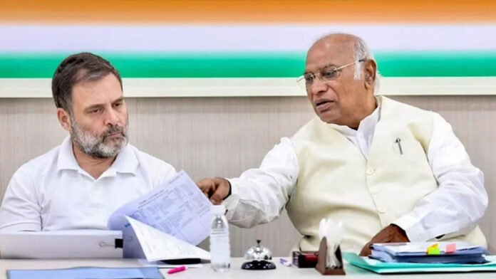 Maharashtra-Congress-Candidate-List a man pointing at a piece of paper